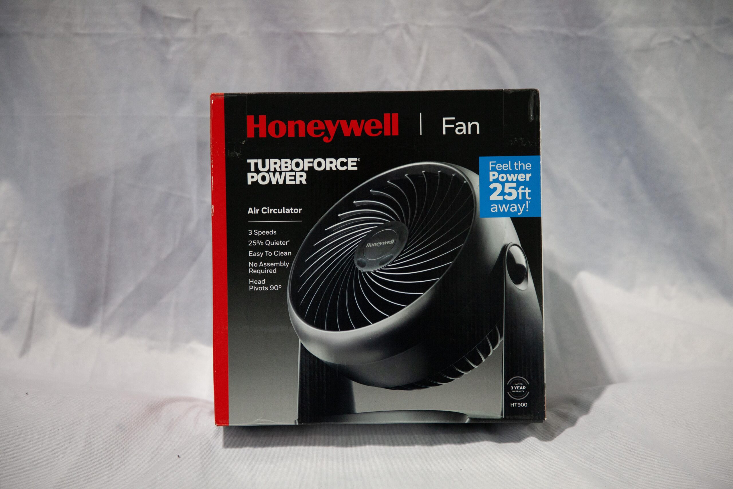 Honeywell TurboForce Power Air Circulator fan packaging featuring three speed settings, quiet operation, easy cleaning, no assembly required, and a pivoting head for directed airflow.
