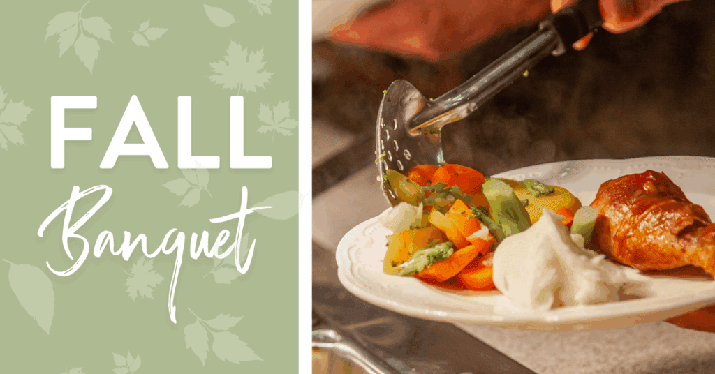 Image shows a hand serving a colorful plate of food, featuring a roasted chicken leg, creamy mashed potatoes, and steamed vegetables at a fall banquet. The vibrant setting emphasizes seasonal dining experiences.