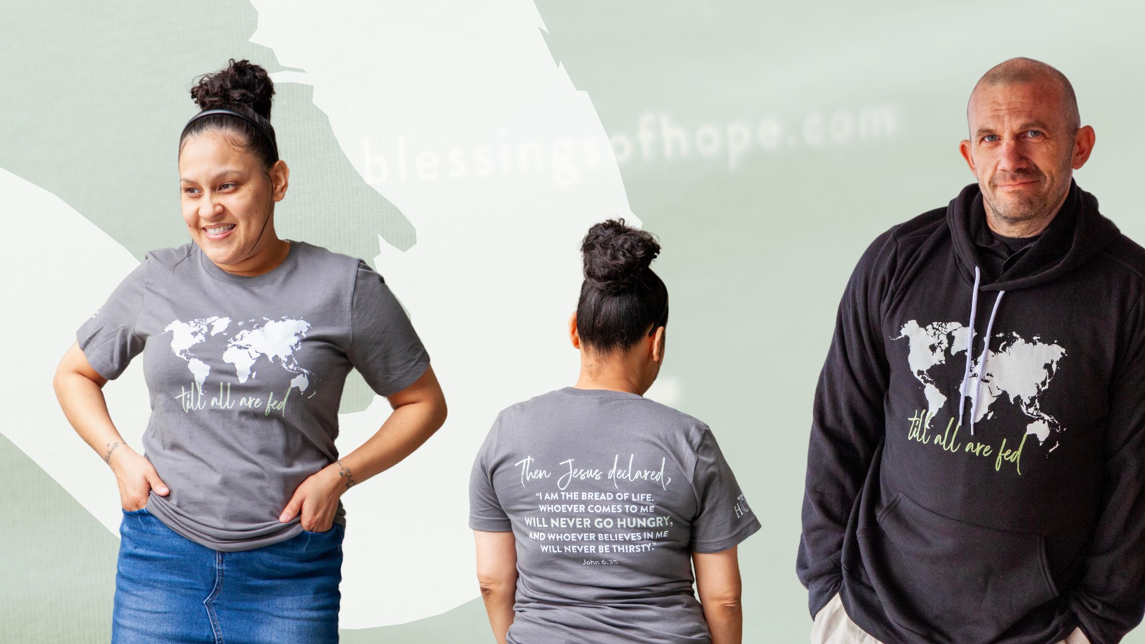 Two individuals wearing matching apparel with a world map graphic, promoting the message "Till all are fed." The woman is in a gray t-shirt showcasing a quote from the Bible, while the man wears a black hoodie with the same graphic. The background features a soft, abstract design, emphasizing their cause and mission with Blessings of Hope.