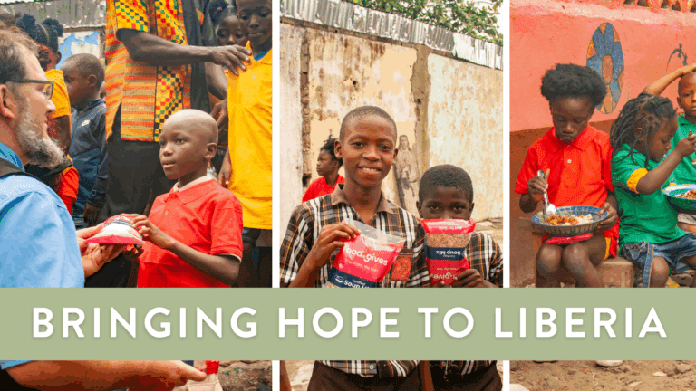 Children in Liberia receive food aid and support, showcasing community engagement and hope. The image features children smiling while holding food packages, with adults assisting in the background.